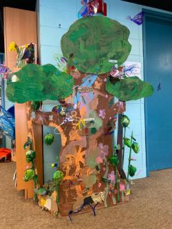 A craft tree made from recycled materials.